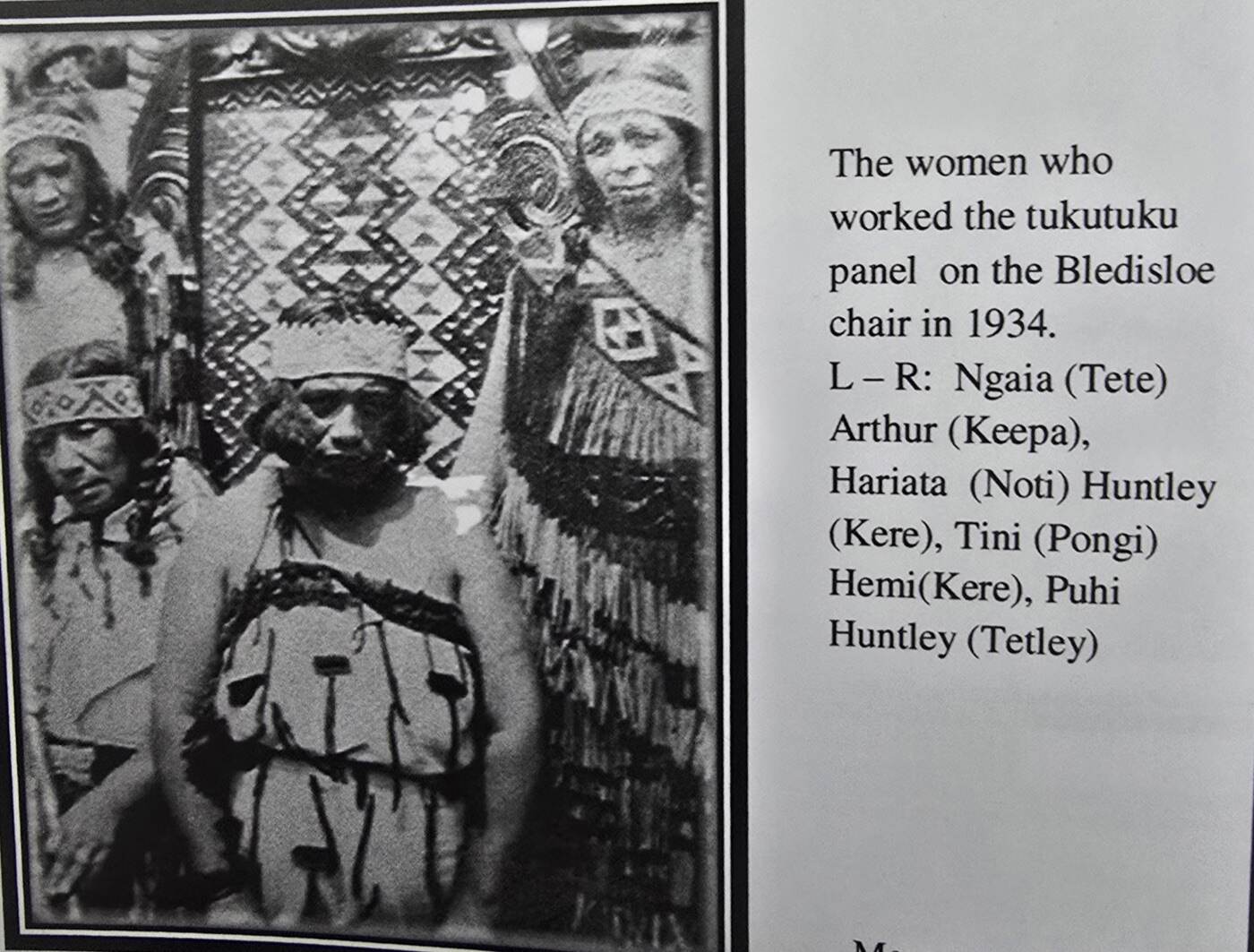 The four women who worked the tukutuku, photographed beside a panel, with the printed caption naming them